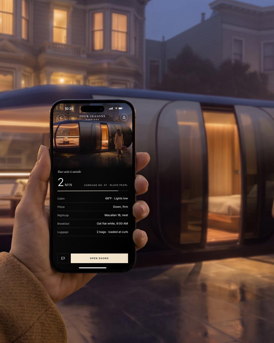 A hand holding an iPhone showing the Carriage app: call